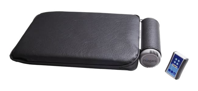 A massage pad with a detachable roller unit and a handheld remote